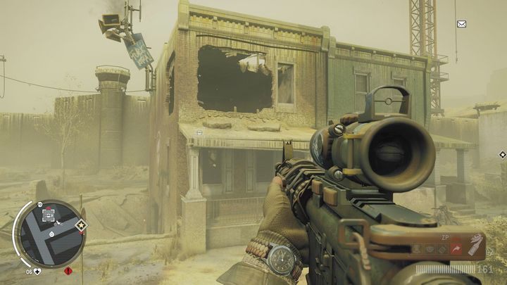 Trzeci magazyn znajdziesz na pierwszym piętrze pokazanego na obrazku budynku - Czerwona strefa Lombard | Magazyny i zlecenia - Homefront: The Revolution - poradnik do gry