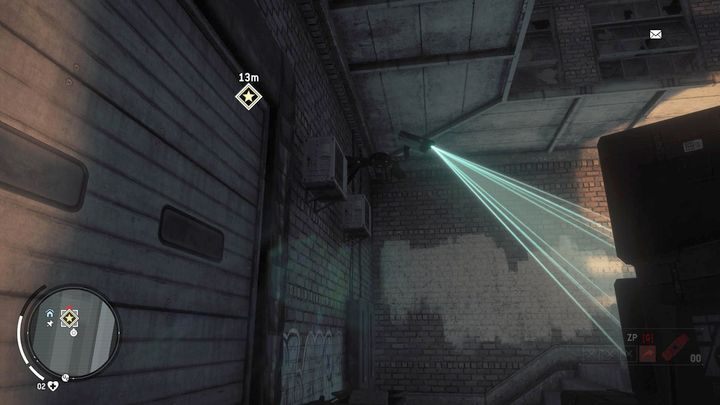 Po drugiej stronie znajdziesz kamerę monitoringu, którą możesz zniszczyć korzystając z pistoletu z tłumikiem lub kuszy - Żółta strefa Earlstone | Punkty kluczowe - Homefront: The Revolution - poradnik do gry