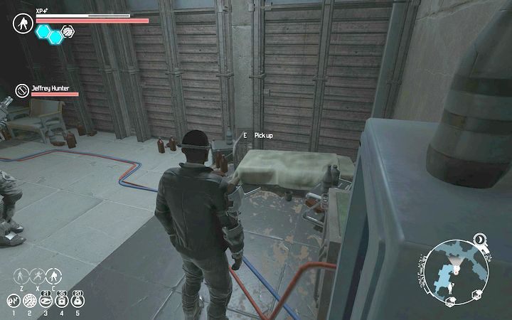 Po oddelegowaniu Scotta z jego kliniki przeszukaj zawartość koło łóżka. - Slumsy | Zadania poboczne | The Technomancer - The Technomancer - poradnik do gry