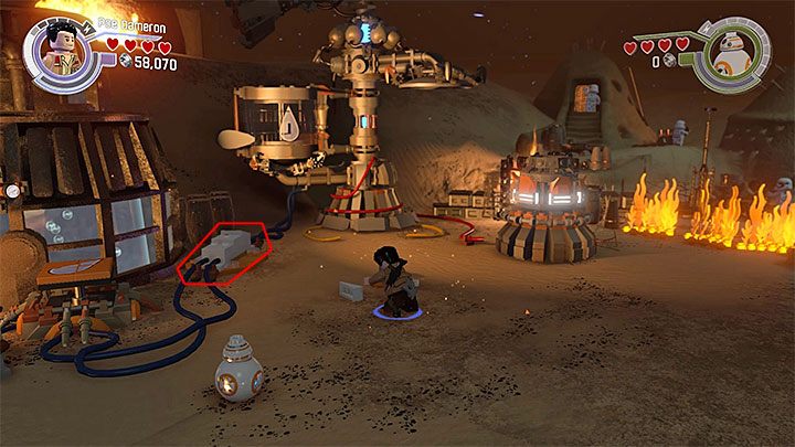 W kolejnej lokacji do rozwiązania jest nieco bardziej złożona zagadka, której założeniem jest wylanie dużej ilości wody na prawe płomienie i odblokowanie sobie tym samym wyjścia z wioski - Rozdział 1 - Szturm na Jakku | Tryb fabularny - LEGO Gwiezdne wojny: Przebudzenie Mocy - poradnik do gry