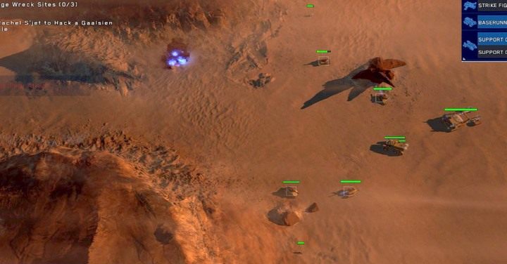 W pozostałych dwóch przejściach wybuduj dwa działka (za skałkami, tak aby nie zniszczyły ich RG), nieco dalej, na wprost wjazdu, rozstaw szeroko dwa AAV i pośrodku, nieco za nimi, dwa RG (AAV będą pierwsze zbierać obrażenia, dając szansę pozostałym jednostkom na atak) - 5 - Kalash Wreck | Kampania | Homeworld Deserts of Kharak - Homeworld: Deserts of Kharak - poradnik do gry