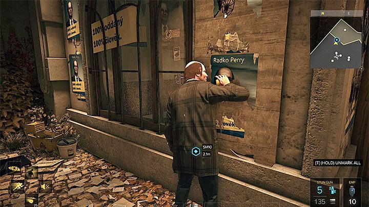 Radko Perryego odnajdziesz przed jego biurem wyborczym - Żniwiarz - zadanie poboczne | Praga (druga wizyta) - Zadania poboczne - Deus Ex: Rozłam Ludzkości - poradnik do gry