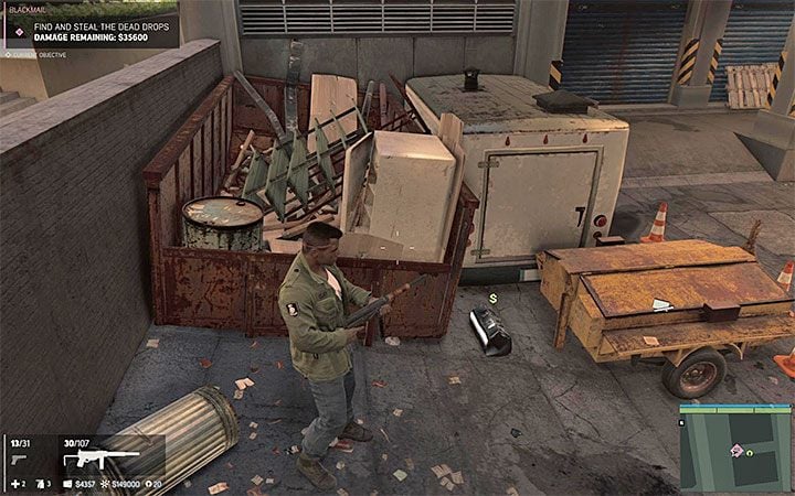 Torby z gotówką znajdują się niedaleko wymalowanych symboli - Biznes szantaży | Misje fabularne w Mafia III - Mafia III - poradnik do gry