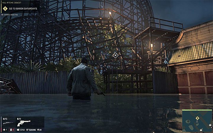 Skorzystaj z dwóch drabinek żeby wejść na teren parku rozrywki - Zamordowanie Ritchiego | Misje fabularne w Mafia III - Mafia III - poradnik do gry