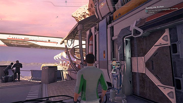 Użycie konsoli przeniesie drużynę do Slumsów, a stamtąd można już wyjść na pustkowia - Polowanie na Archonta (Hunting the Archon) | Operacje priorytetowe w Andromeda - Mass Effect: Andromeda - poradnik do gry