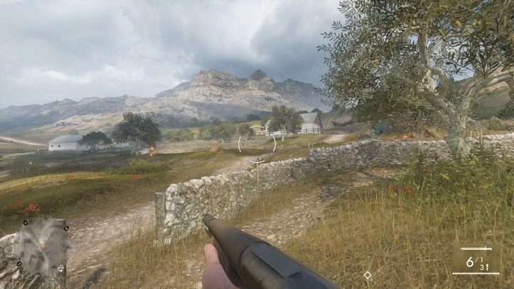 Idź do budynku daleko po lewej stronie, aby znaleźć następny podręcznik polowy - Goniec | Podręczniki polowe w Battlefield 1 - Battlefield 1 - poradnik do gry