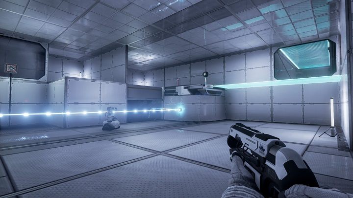 Po wejściu do pomieszczenia zauważamy robota i pulsującą wiązkę energii - Chapter 7 - Opis przejścia - The Turing Test - poradnik do gry