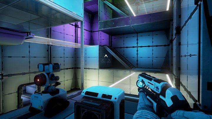 Robota przenosimy obok pojemnika który otwiera nam mosty, wpuszczamy mu do wolnego miejsca czerwoną wiązkę, a sami zabieramy ze sobą niebieską - Chapter 6 - Opis przejścia - The Turing Test - poradnik do gry