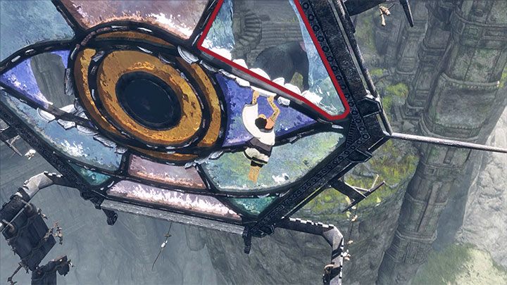 Zacznij się tu wspinać poprzez doskakiwanie do wyżej położonych krawędzi i następnie przemieszczanie się przy jednej ze ścianek witrażu - Wspinaczka na wysokości | The Last Guardian - The Last Guardian - poradnik do gry