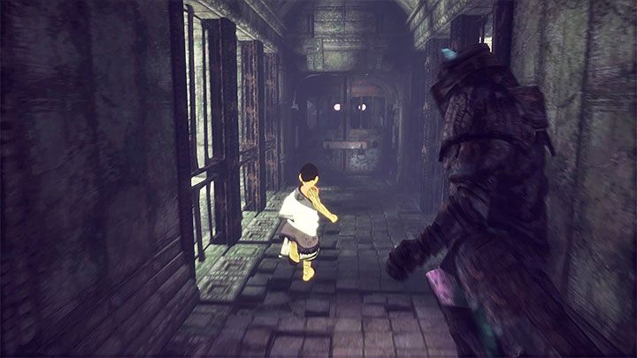 Zdejmij blokadę zanim chłopczyka dościgną ożywione zbroje - Nakarmienie Trico i wydostanie się z sali z dużą kopułą | The Last Guardian - The Last Guardian - poradnik do gry