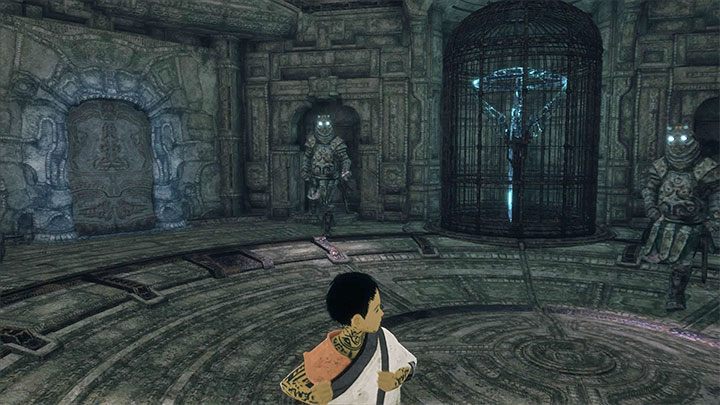 Po zeskoczeniu do sali z klatką pojawią się przeciwnicy - Przetoczenie klatki i wyjście z ruin wraz z Trico | The Last Guardian - The Last Guardian - poradnik do gry