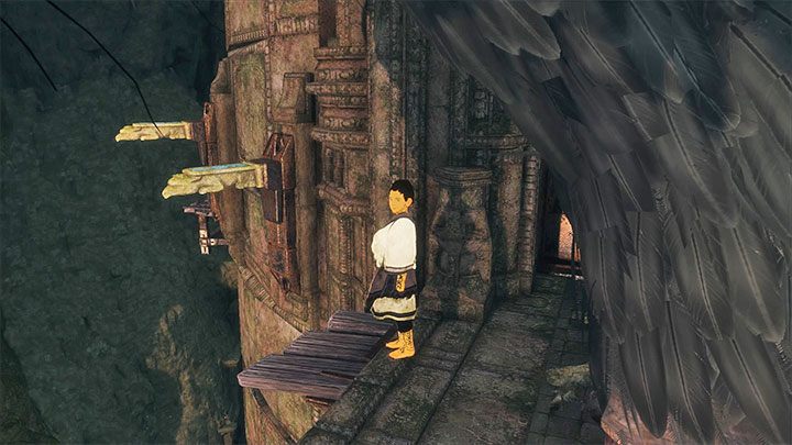 Po tym jak Trico doskoczy do wnętrza wieży nakieruj go na okoliczny most - Dotarcie do najwyższej wieży - The Last Guardian - poradnik do gry