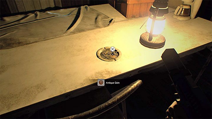 Przykładowa antyczna moneta - Resident Evil 7: Osiągnięcia, trofea - lista - Resident Evil 7 - poradnik, solucja