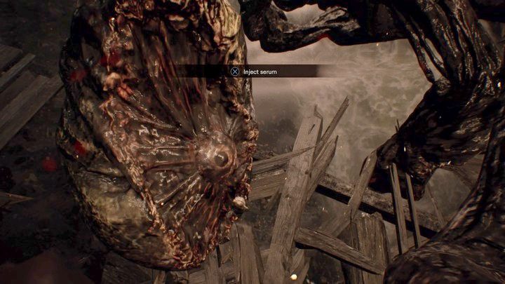 Gdy pojawi się opcja wstrzyknięcia serum potworowi - zrób to natychmiast, inaczej zginiesz - Resident Evil 7: Strefa testów i hangar - solucja - Resident Evil 7 - poradnik, solucja