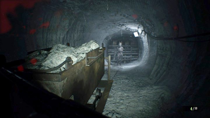 Droga w kopalni jest liniowa - nadal musisz uważać na wybuchające skrzynki oraz porozwieszane pułapki na linkach, na razie brak sekretów - Resident Evil 7: Kopalnia soli (Salt Mine) - solucja - Resident Evil 7 - poradnik, solucja