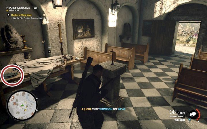 W budynku znajdziesz ciało pilota i taśmę - Odszukaj amerykańskiego pilota w lokacji Wiadukt Regilino | Sniper Elite 4 - Sniper Elite 4 - poradnik do gry