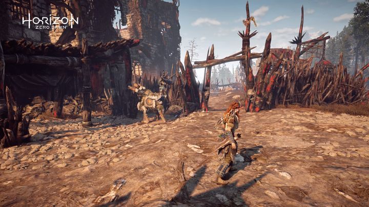 Od ogniska w obozie udaj się w kierunku południowej bramy - Horizon Zero Dawn: Manekiny Żuwaczy - gdzie znajdę? - Horizon Zero Dawn - poradnik, solucja