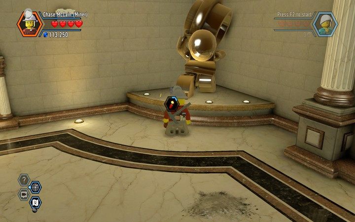 Wysadź dynamitem posąg, a będziesz mógł wejść za drugą kasę - Kradzież kamienia z banku | Rozdział 6 w Lego City: Tajny Agent - LEGO City: Tajny Agent - poradnik do gry