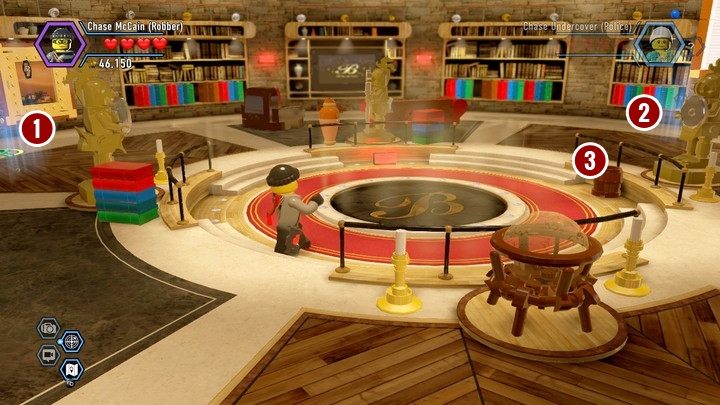 Zacznij od zbadania tropów (1) (po prawej stronie ukryty jest pod meblem (2)) - Posiadłość Blackwella w Lego City: Tajny Agent - LEGO City: Tajny Agent - poradnik do gry