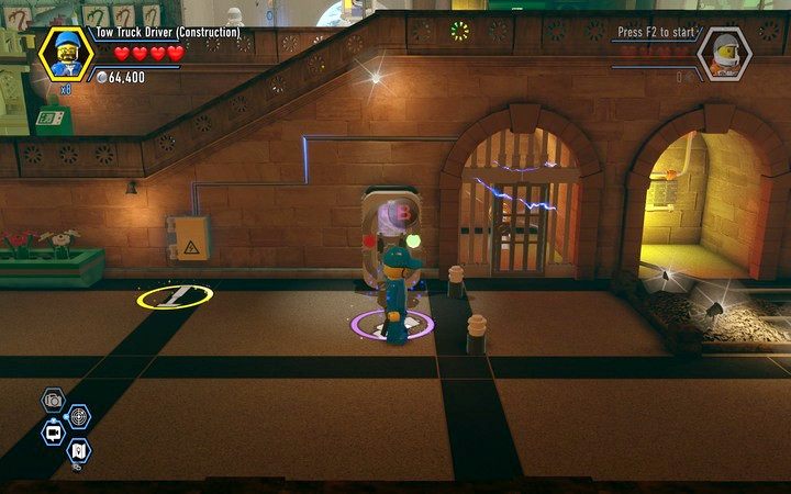 Za kratą pod napięciem odnajdziesz żeton postaci - Sekrety w muzeum w Lego City: Tajny Agent - LEGO City: Tajny Agent - poradnik do gry