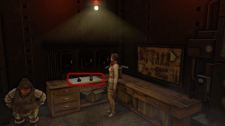 Przyjrzyj się rzeczom na biurku - w zbliżeniu podnieś leżącą po prawej lampę, a Kate połączy ją z podstawką po lewej - Pozbądź się potwora | Rozdział czwarty | Opis przejścia Syberia 3 - Syberia 3 - poradnik do gry