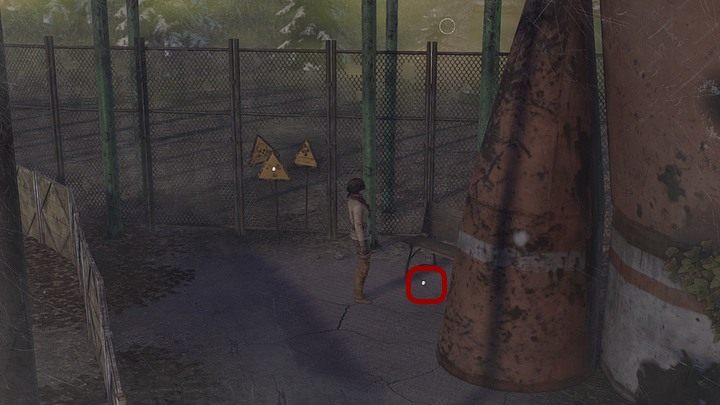 Tam ponieś z ziemi metalowy pręt (trzonek 01) leżący pod ławką (na prawo od ostrzegawczych żółtych znaków w kształcie trójkątów) - Napraw automat | Rozdział piąty | Opis przejścia Syberia 3 - Syberia 3 - poradnik do gry