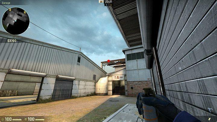 Ustaw się w rogu garażu i wyceluj w oznaczony na obrazku punkt - Cache | Mapy Turniejowe | CS GO - CS GO - poradnik do gry