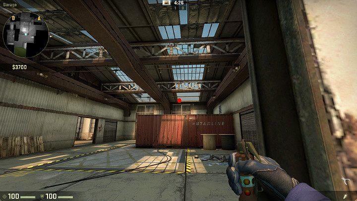 Ustaw się we wskazanym miejscu, zaraz przy wejściu do garażu i wyceluj w oznaczony na obrazku punkt - Cache | Mapy Turniejowe | CS GO - CS GO - poradnik do gry