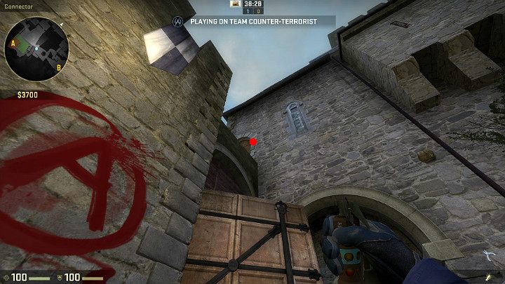 Przechodząc przez łącznik w stronę środka A wyceluj w oznaczony na obrazku punkt i zwolnij rzut LPM - Cobblestone | Mapy Turniejowe | CS GO - CS GO - poradnik do gry