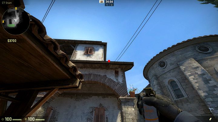Ustaw się obok studni i wyceluj w linię dachu po czym wykonaj rzut przy pomocy LPM - Inferno | Mapy turniejowe | CS GO - CS GO - poradnik do gry