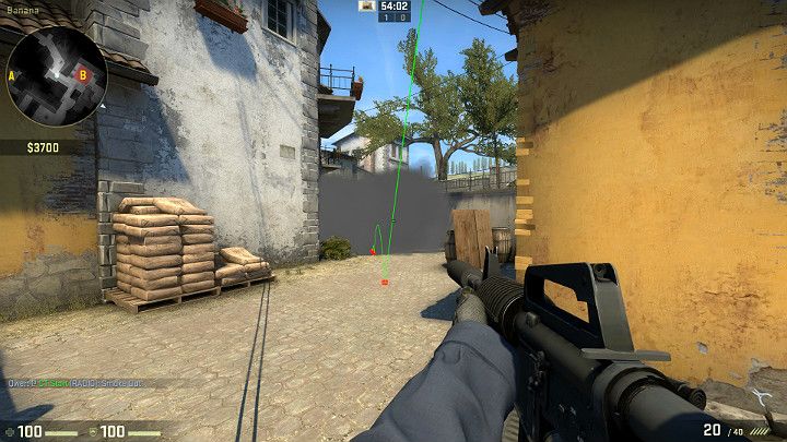 Granat wyląduje na bananie tworząc zasłonę dymną przed Graczami patrzącymi od strony miejsca odrodzenia Terrorystów - Inferno | Mapy turniejowe | CS GO - CS GO - poradnik do gry