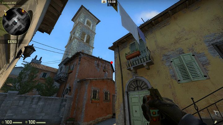 Ustaw się plecami do budynku i wceluj w oznaczony punkt, który znajduje się dokładnie na szczycie dachu - Inferno | Mapy turniejowe | CS GO - CS GO - poradnik do gry