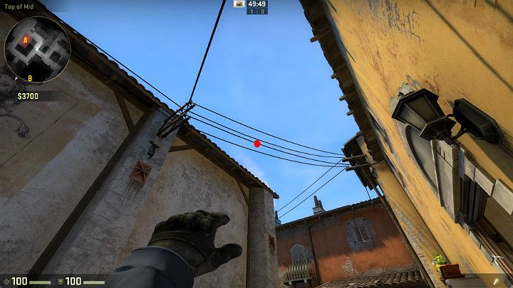 Ustaw się zaraz obok wejścia do mieszkania i wyceluj w oznaczony na obrazku punkt - Inferno | Mapy turniejowe | CS GO - CS GO - poradnik do gry