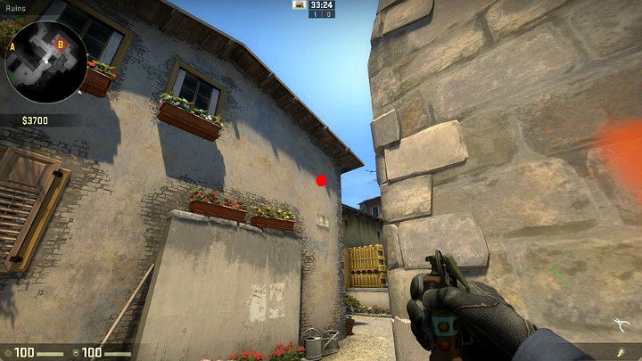 Przed wejściem na punkt podłożenia bomby B ustaw się przy rogu ściany i wyceluj w oznaczony punkt po czym wykonaj rzut za pomocą LPM - Inferno | Mapy turniejowe | CS GO - CS GO - poradnik do gry