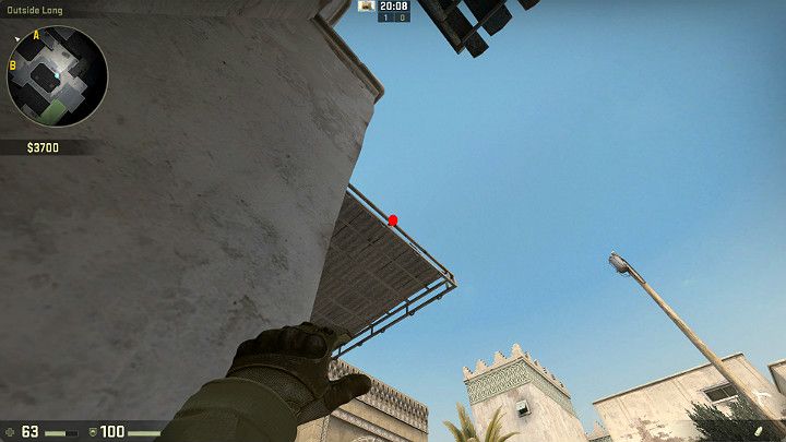 Kolejny rzut od strony Terrorystów możesz wykonać ustawiając się w rogu budynku i celując w wyznaczone miejsce - Dust 2 | Mapy Turniejowe | CS GO - CS GO - poradnik do gry