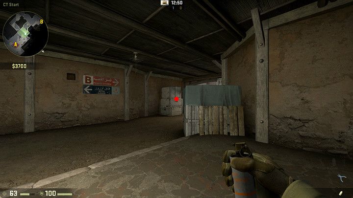 Stojąc w tunelu Antyterrorystów wyceluj w skrzynki po czym wykonaj rzut LPM w trakcie ruchu - Dust 2 | Mapy Turniejowe | CS GO - CS GO - poradnik do gry