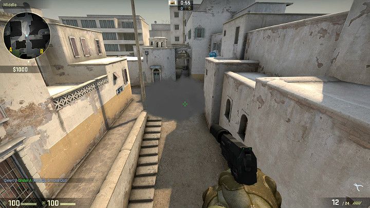 Granat stworzy zasłonę przed atakami z miejsca odrodzenia Terrorystów oraz ograniczy widoczność Graczy starających się patrzeć przez drzwi samemu będąc schowanym za beczkami z lewej strony, zaraz za słupem telegraficznym - Dust 2 | Mapy Turniejowe | CS GO - CS GO - poradnik do gry