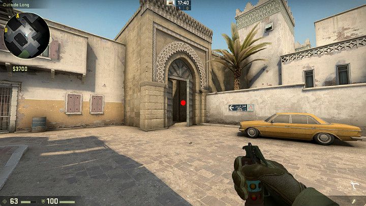 W trakcie szturmowania przez widoczny na obrazku tunel przygotuj granat błyskowo-hukowy i celuj mniej więcej w zaznaczone miejsce - Dust 2 | Mapy Turniejowe | CS GO - CS GO - poradnik do gry