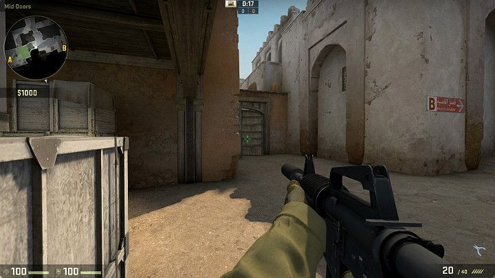 Drzwi widoczne na powyższym obrazku są kolejnym przejściem, które należy osłaniać - Dust 2 | Mapy Turniejowe | CS GO - CS GO - poradnik do gry