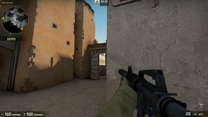 Stojąc w tym miejscu masz oko na wąskie przejście prowadzące do punktu podłożenia bomby A - Dust 2 | Mapy Turniejowe | CS GO - CS GO - poradnik do gry
