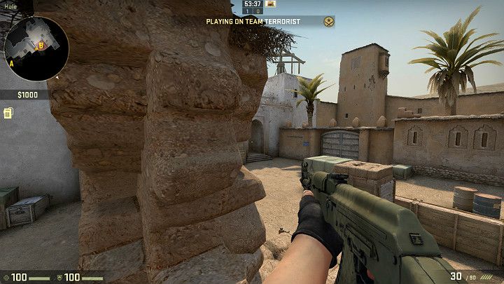 Stojąc we wcześniej wspomnianej wyrwie w murze masz bardzo dobry widok na tunel w którym może pojawić się przeciwnik zamierzający podłożyć bombę - Dust 2 | Mapy Turniejowe | CS GO - CS GO - poradnik do gry