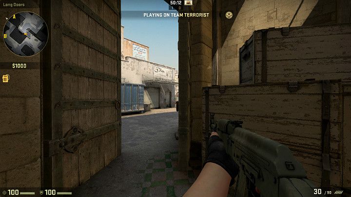 Widok na długie przejście w stronę punktu A widziany z perspektywy atakującego Terrorysty - Dust 2 | Mapy Turniejowe | CS GO - CS GO - poradnik do gry