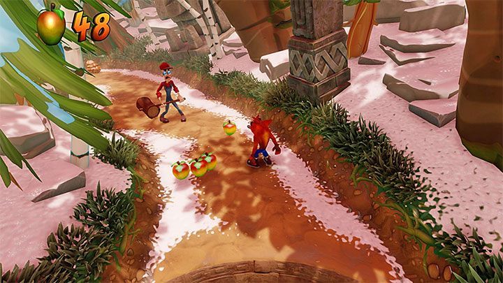 Kontynuuj eksplorację opisywanego etapu i po drodze uderz w skrzynię z wykrzyknikiem, dzięki czemu doprowadzisz do zdetonowania wszystkich ominiętych skrzynek z nitrogliceryną - Diggin It | Alpine Warp Room | Opis przejścia | Crash Bandicoot N. Sane Trilogy - Crash Bandicoot N. Sane Trilogy - poradnik do gry