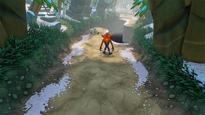 Wyrusz dalej i dotrzyj do pokazanego na obrazku małego niedźwiadka, który pomógł ci w zaliczeniu ostatniej części poziomu Un-Bearable - Totally Bear | Crash Bandicoot 2 - ukryte poziomy | Crash N. Sane Trilogy - Crash Bandicoot N. Sane Trilogy - poradnik do gry