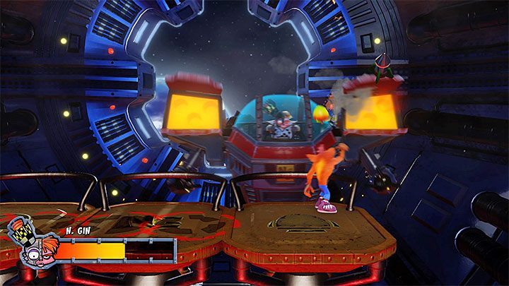 W ramach drugiej fazy pojedynku Nitrus Gin polega na atakach rakietowych, przy czym są one łatwe do omijania - Mech Wrecked | Crash Bandicoot 2 | Trofea - Crash Bandicoot N. Sane Trilogy - poradnik do gry