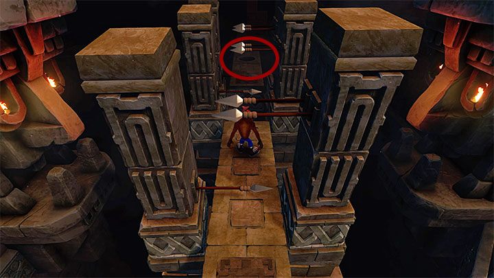 Drugi token możesz pozyskać niedługo po dotarciu do pokazanej na obrazku lokacji z wysuwającymi się włóczniami - Cortexs Terrifying Trial | Crash Bandicoot - Trofea - Crash Bandicoot N. Sane Trilogy - poradnik do gry
