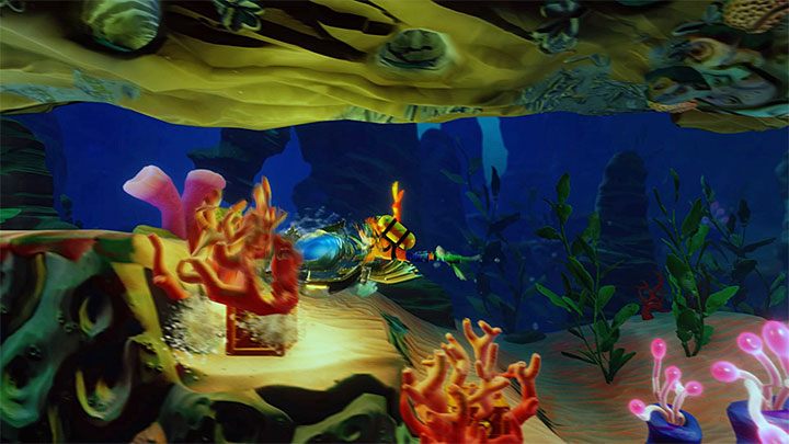 Wypłyń z metalowej konstrukcji i wejdź w interakcję ze swego rodzaju łodzią podwodną, która przez jakiś czas (niestety nie aż do samego końca etapu) posłuży ci do dalszych wojaży - Under Pressure | Crash Bandicoot 3 | Opis przejścia | Crash N. Sane Trilogy - Crash Bandicoot N. Sane Trilogy - poradnik do gry