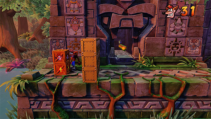 Pierwszych kłopotów spodziewaj się tuż po rozpoczęciu etapu, gdyż do pokazanych na powyższym obrazku skrzynek nie możesz łatwo dotrzeć - The Lost City | Wumpa Island | Opis przejścia | Crash Bandicoot N. Sane Trilogy - Crash Bandicoot N. Sane Trilogy - poradnik do gry