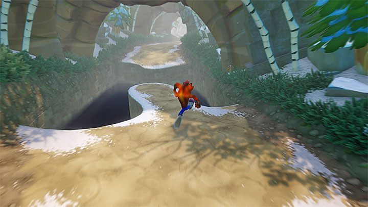 Jeśli chcesz już teraz zakończyć ten etap to udaj się w dół ekranu i dotrzyj do portalu (przy okazji odbierz czysty klejnot jeśli zdołałeś zniszczyć wszystkie skrzynie) - Un-Bearable | Sewer Warp Room | Opis przejścia | Crash Bandicoot N. Sane Trilogy - Crash Bandicoot N. Sane Trilogy - poradnik do gry