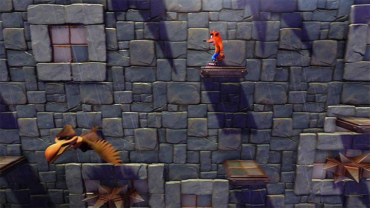 Wskocz na jedną z platform napędzanych przez obrotowy mechanizm - Slippery Climb | Cortex Island | Opis przejścia | Crash N. Sane Trilogy - Crash Bandicoot N. Sane Trilogy - poradnik do gry